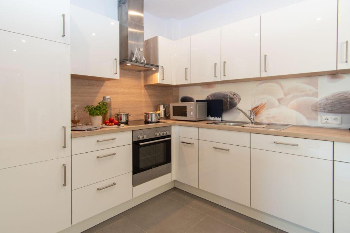 Haus-Wilhelmsplatz-Wohnung-Heimathafen Хайлигенхафен Экстерьер фото